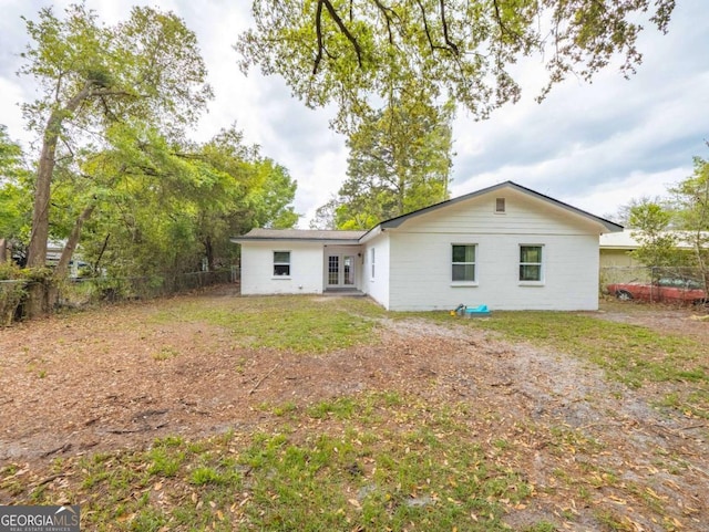 244 Sherwood Ln, Brunswick, GA 31525 - back of property featuring french doors