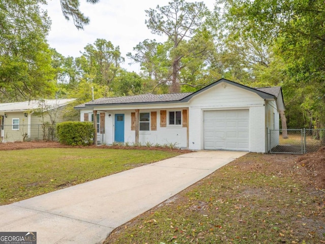 244 Sherwood Ln, Brunswick, GA 31525 - ranch-style house featuring a garage and concrete driveway