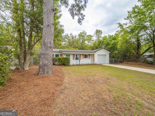 244 Sherwood Ln, Brunswick, GA 31525 - single story home with driveway and an attached garage