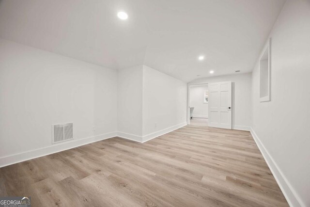 2433 Helmsdale Dr NE, Atlanta, GA 30345 - empty room featuring recessed lighting, visible vents, light wood-type flooring, and baseboards