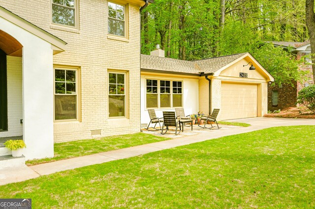 2433 Helmsdale Dr NE, Atlanta, GA 30345 - exterior space featuring a garage and concrete driveway