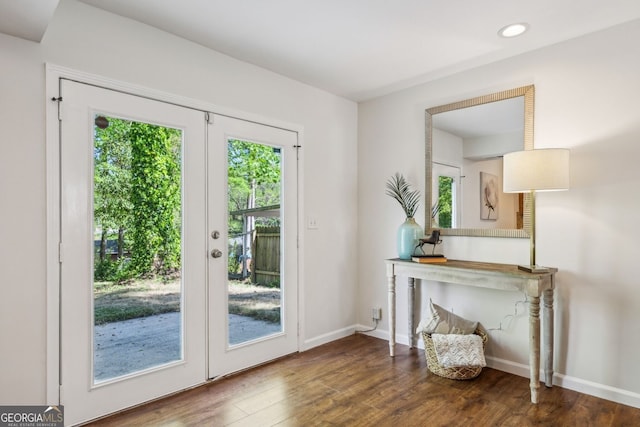 entryway with plenty of natural light, wood finished floors, french doors, and recessed lighting