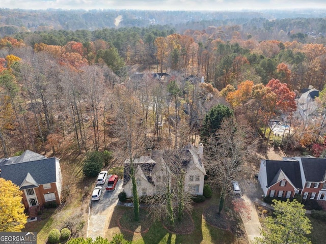 760 Woodrow Dr, Lawrenceville, GA 30043 - drone / aerial view with a wooded view