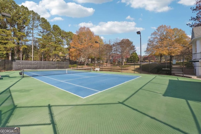 760 Woodrow Dr, Lawrenceville, GA 30043 - view of tennis court with fence