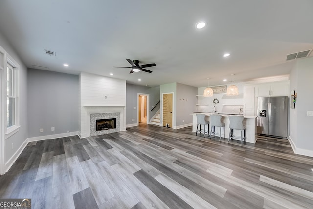 1762 Green Rd, Buford, GA 30518 - unfurnished living room with a ceiling fan, stairway, recessed lighting, and dark wood finished floors