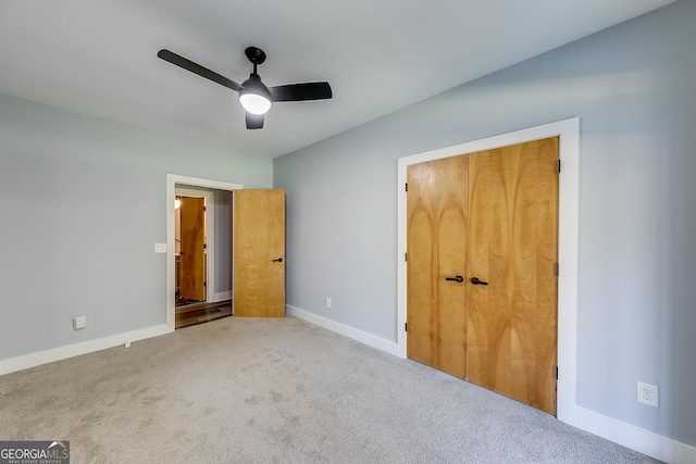 1762 Green Rd, Buford, GA 30518 - unfurnished bedroom with carpet floors, baseboards, and ceiling fan