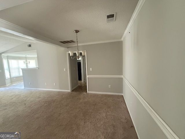 unfurnished dining area with visible vents, carpet flooring, and an inviting chandelier