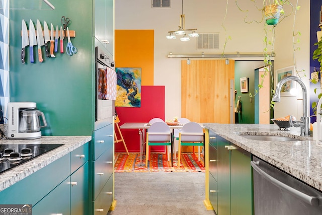 130 Arizona Ave NE Unit 415, Atlanta, GA 30307 - kitchen with green cabinets, concrete flooring, visible vents, a sink, and stainless steel appliances