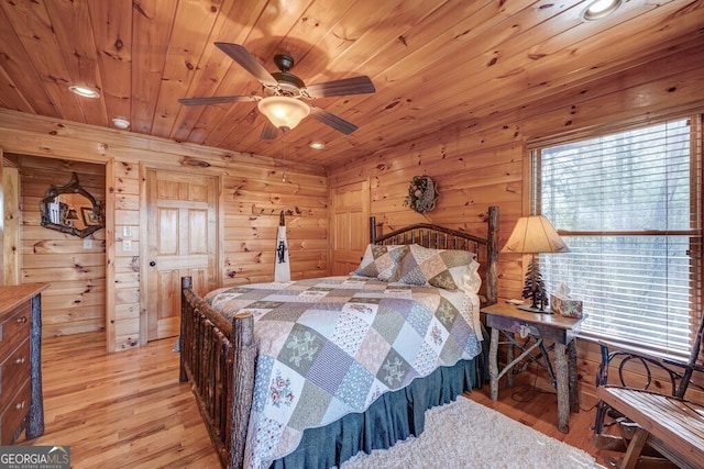 425 Rhonda Ln, Mineral Bluff, GA 30559 - bedroom with multiple windows, wooden ceiling, light wood-style flooring, wood walls, and recessed lighting
