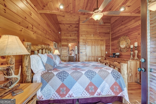 425 Rhonda Ln, Mineral Bluff, GA 30559 - bedroom with wood walls, wooden ceiling, wood finished floors, and ceiling fan