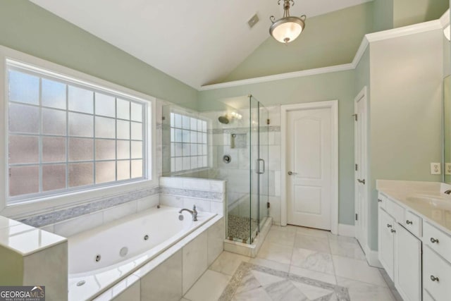 5615 Toccoa Dr, Douglasville, GA 30135 - bathroom featuring visible vents, a jetted tub, vaulted ceiling, vanity, and a stall shower