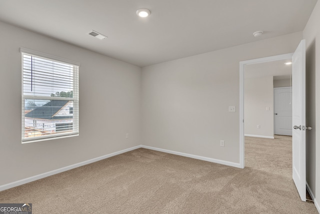 219 Rusty Plow Ln Unit 69, Perry, GA 31069 - unfurnished room featuring light carpet and baseboards