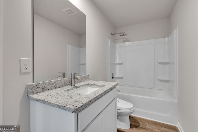 219 Rusty Plow Ln Unit 69, Perry, GA 31069 - bathroom featuring visible vents, toilet, shower / bath combination, vanity, and wood finished floors