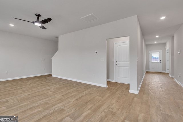 219 Rusty Plow Ln Unit 69, Perry, GA 31069 - empty room with ceiling fan, light wood finished floors, and recessed lighting