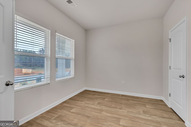 219 Rusty Plow Ln Unit 69, Perry, GA 31069 - spare room with light wood finished floors, baseboards, and visible vents