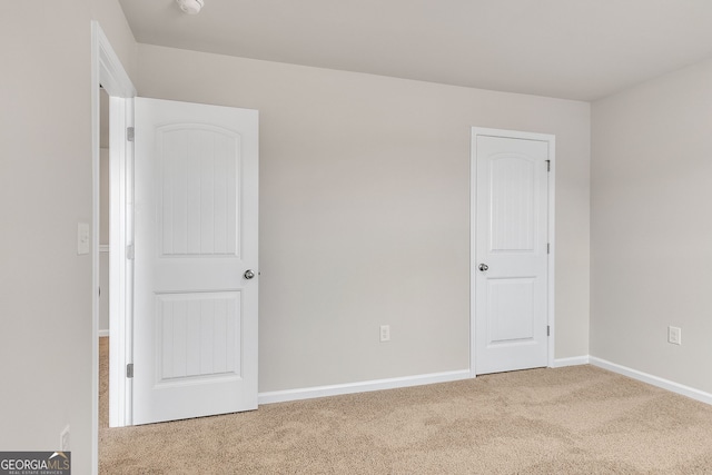 219 Rusty Plow Ln Unit 69, Perry, GA 31069 - unfurnished bedroom with carpet floors and baseboards