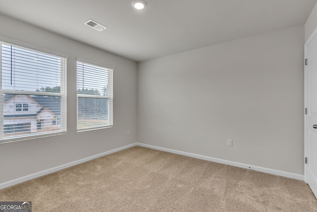 219 Rusty Plow Ln Unit 69, Perry, GA 31069 - carpeted empty room with visible vents and baseboards