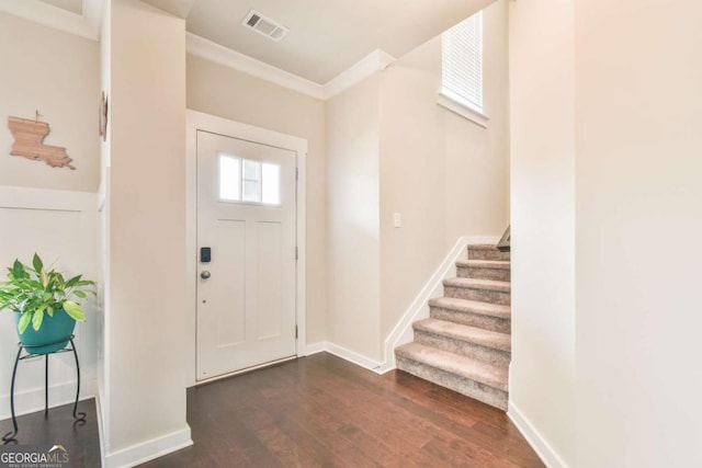 entryway featuring visible vents, baseboards, stairway, and dark wood-style floors