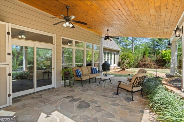view of patio featuring outdoor lounge area and ceiling fan