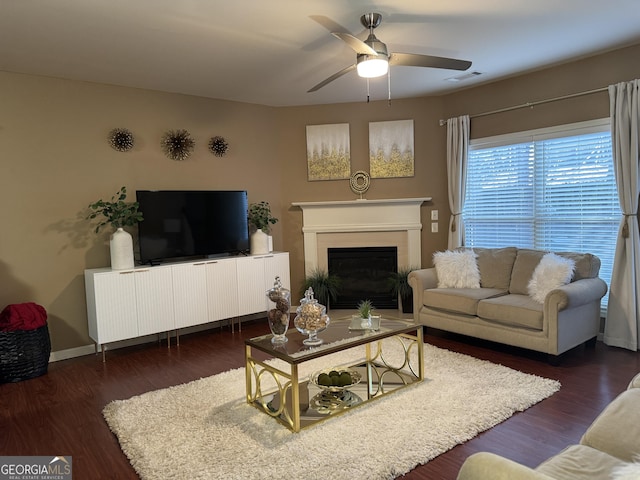 3627 Mcclaren Way, Lawrenceville, GA 30044 - living area with a fireplace, visible vents, a ceiling fan, and wood finished floors