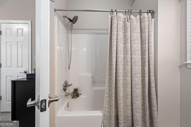 full bath featuring shower / bath combo with shower curtain