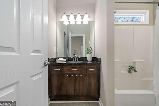 full bathroom featuring shower / bathtub combination with curtain and vanity