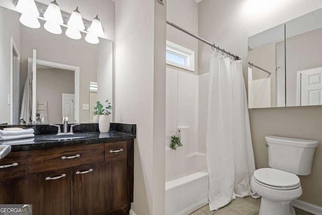 full bath with shower / tub combo, toilet, tile patterned flooring, and vanity