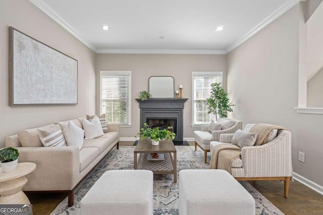 living room with baseboards, a fireplace, crown molding, recessed lighting, and wood finished floors