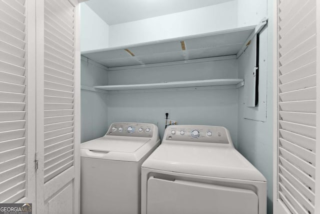 6500 Gaines Ferry Rd, Flowery Branch, GA 30542 - washroom with separate washer and dryer and laundry area