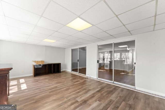 6500 Gaines Ferry Rd, Flowery Branch, GA 30542 - interior space featuring a paneled ceiling, wood finished floors, and baseboards