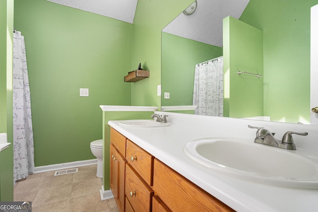 130 Manning Mill Rd NW, Adairsville, GA 30103 - bathroom featuring toilet, baseboards, and double vanity