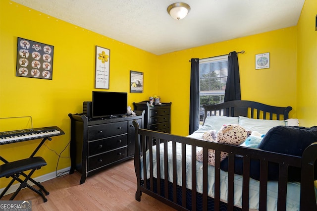 130 Manning Mill Rd NW, Adairsville, GA 30103 - bedroom featuring wood finished floors and baseboards