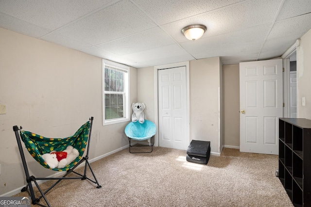 130 Manning Mill Rd NW, Adairsville, GA 30103 - living area with carpet floors, a paneled ceiling, and baseboards
