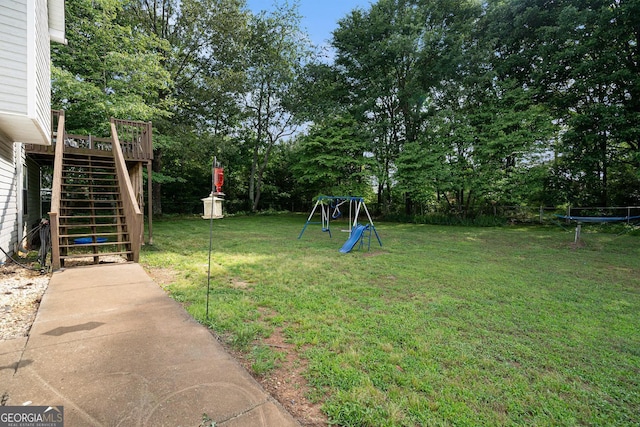 130 Manning Mill Rd NW, Adairsville, GA 30103 - view of green lawn with stairs, view of wooded area, and a wooden deck