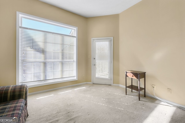1250 Parkwood Cir SE Unit 2310, Atlanta, GA 30339 - sitting room featuring baseboards and carpet flooring