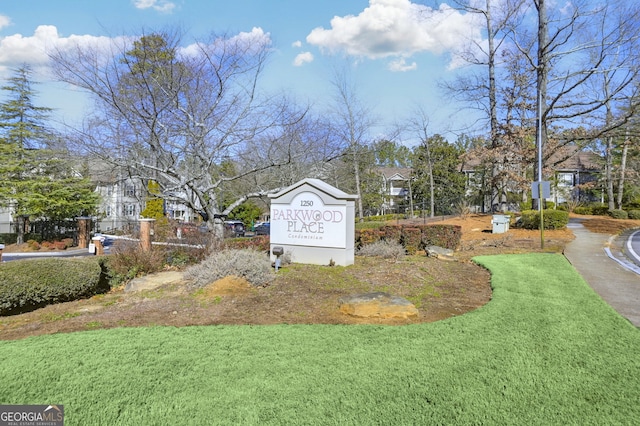 1250 Parkwood Cir SE Unit 2310, Atlanta, GA 30339 - community sign featuring a lawn