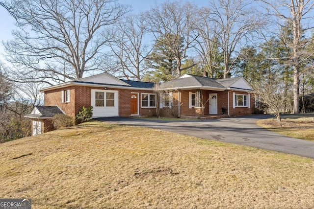 340 Lavista Dr, Blue Ridge, GA 30513 - ranch-style house with brick siding, a front yard, and driveway