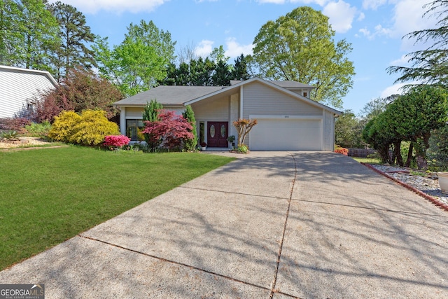 890 Muirfield Rdg, Marietta, GA 30068 - view of front of property featuring a front lawn, an attached garage, and concrete driveway