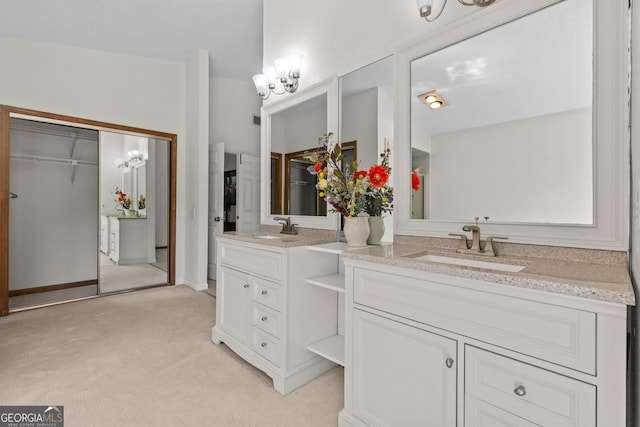 890 Muirfield Rdg, Marietta, GA 30068 - full bathroom featuring double vanity, a sink, and a notable chandelier
