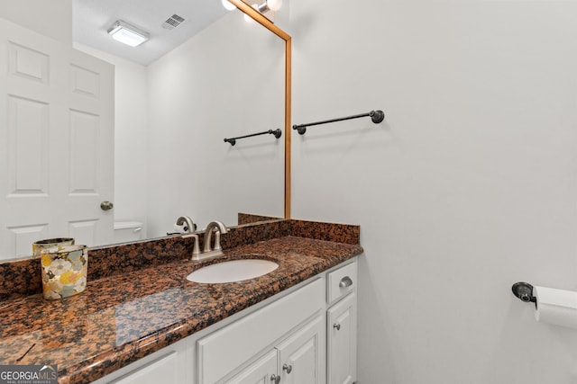 890 Muirfield Rdg, Marietta, GA 30068 - bathroom featuring visible vents, toilet, and vanity