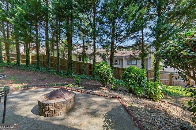 890 Muirfield Rdg, Marietta, GA 30068 - view of yard with a patio area, an outdoor fire pit, and fence