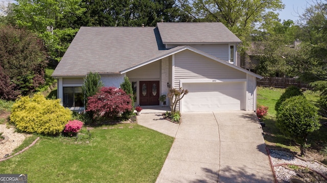 890 Muirfield Rdg, Marietta, GA 30068 - view of front of property with a front yard, a shingled roof, driveway, and an attached garage