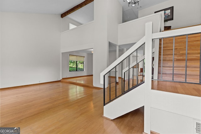 890 Muirfield Rdg, Marietta, GA 30068 - stairway featuring beam ceiling, high vaulted ceiling, and wood finished floors