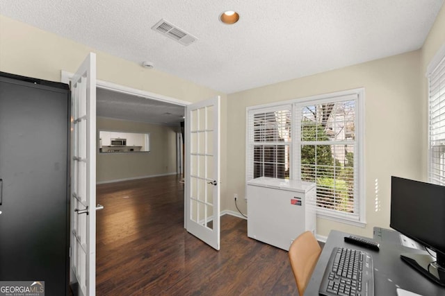 208 Bainbridge Dr, Atlanta, GA 30327 - office area with visible vents, baseboards, a textured ceiling, wood finished floors, and french doors