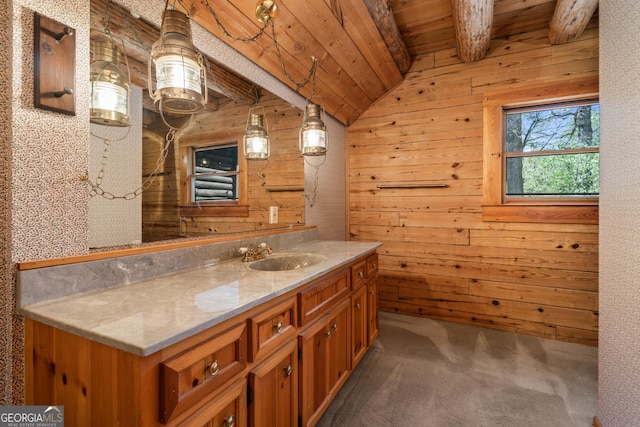 bathroom featuring wood walls, vaulted ceiling with beams, vanity, and wooden ceiling