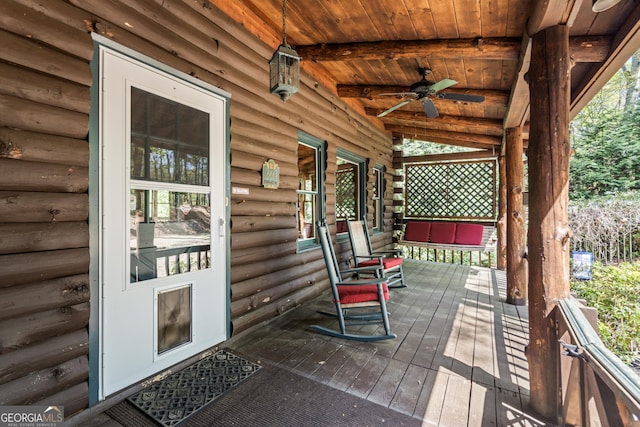 wooden deck with ceiling fan