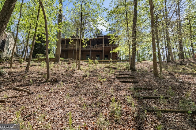 view of yard featuring a wooden deck