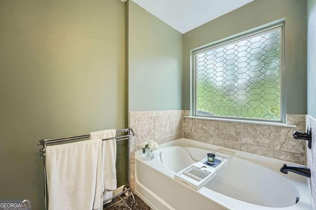 full bath featuring a bath