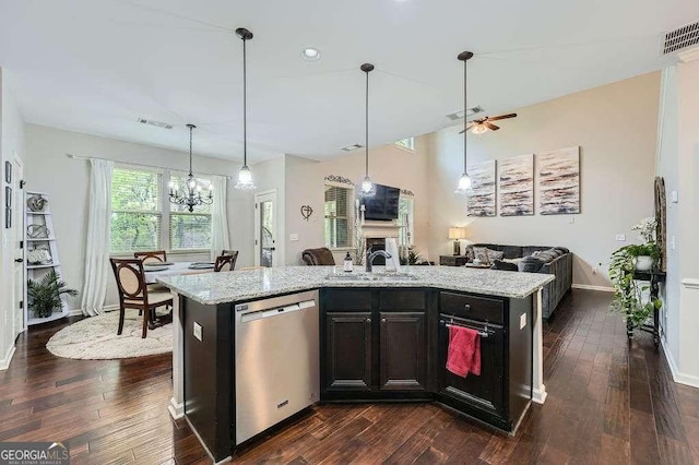kitchen with a sink, open floor plan, stainless steel dishwasher, and visible vents