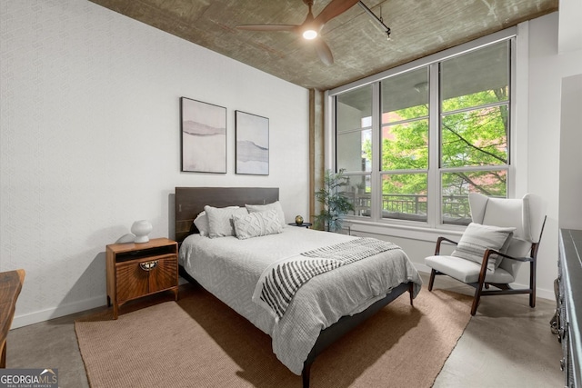 245 N Highland Ave NE Unit 220, Atlanta, GA 30307 - bedroom with baseboards and ceiling fan